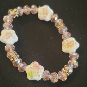Floral Charm Bracelet with Pink and Gold Accents